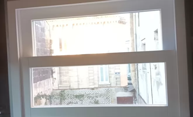fenêtre bois sur mesure laque en blanc avec double vitrage 